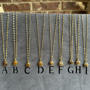 Upcycled Designer Charm Necklace . . . a second story, reimagined
