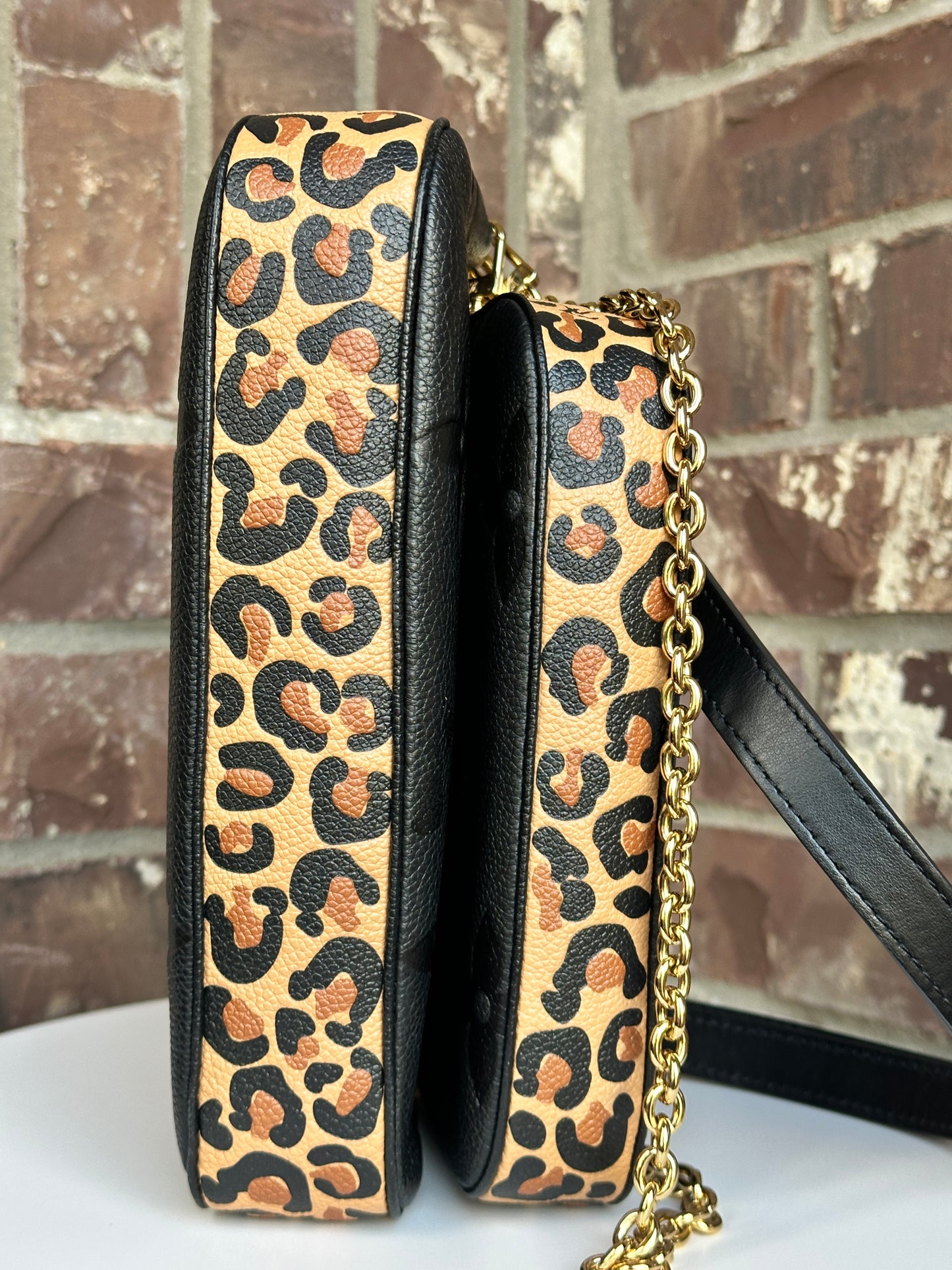 Louis Vuitton Multi Pochette Accessoires Wild at Heart Monogram Empreinte Giant	61134