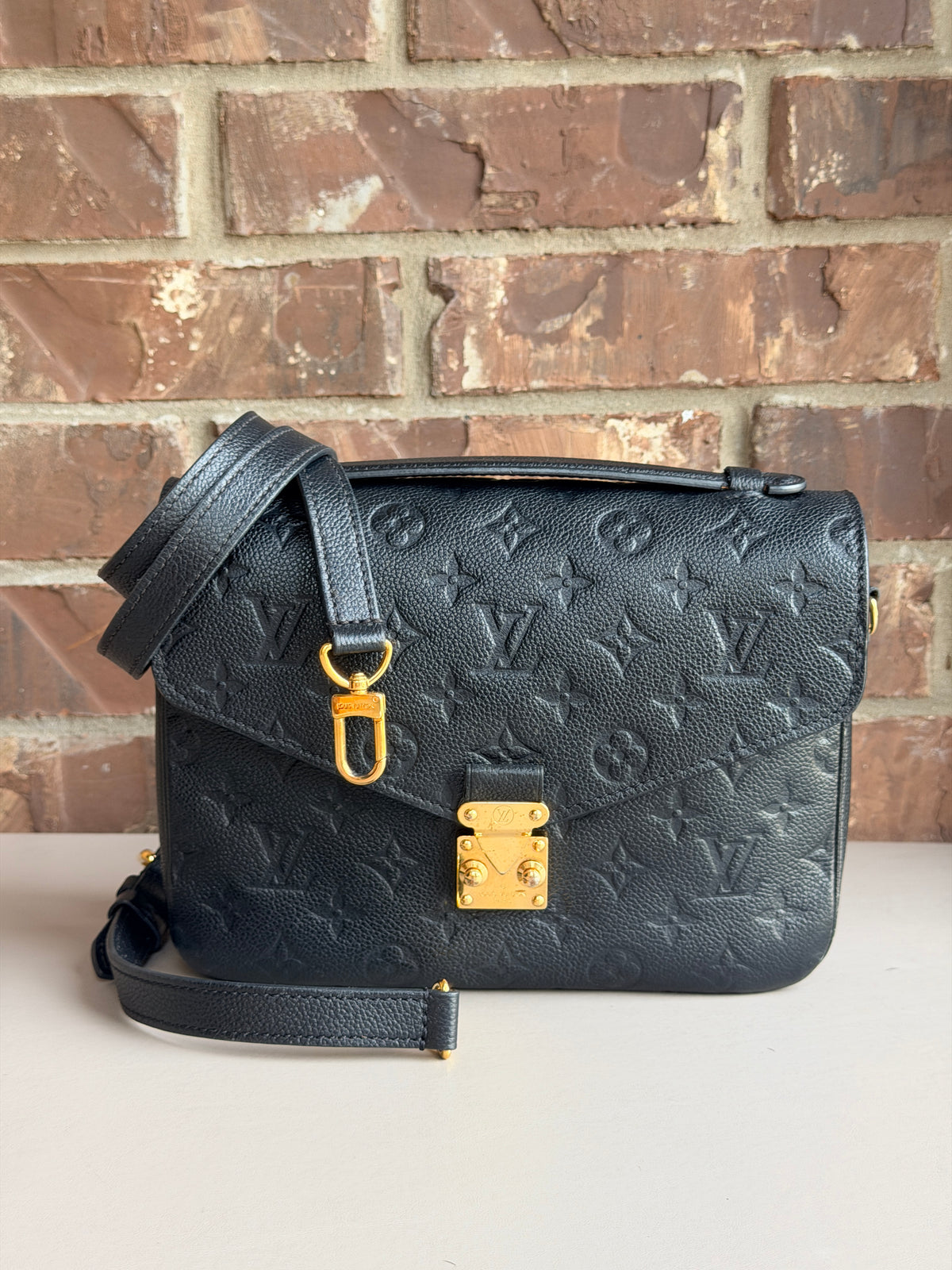 Louis Vuitton Pochette Metis Monogram Empreinte Leather Black 57342