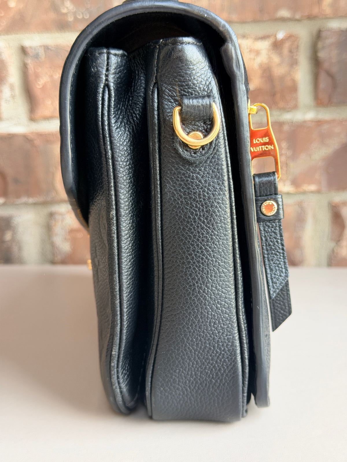 Louis Vuitton Pochette Metis Monogram Empreinte Leather Black 57342