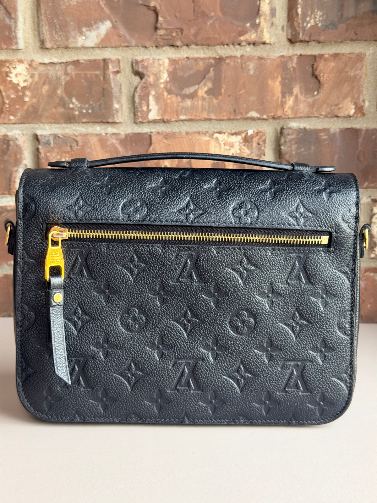 Louis Vuitton Pochette Metis Monogram Empreinte Leather Black 57342