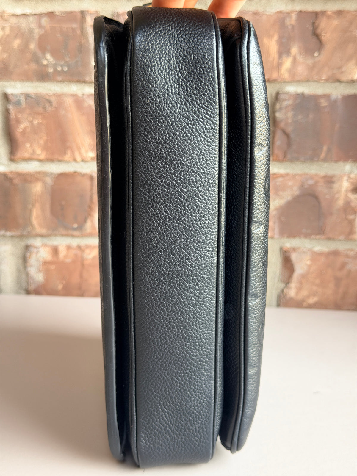 Louis Vuitton Pochette Metis Monogram Empreinte Leather Black 57342