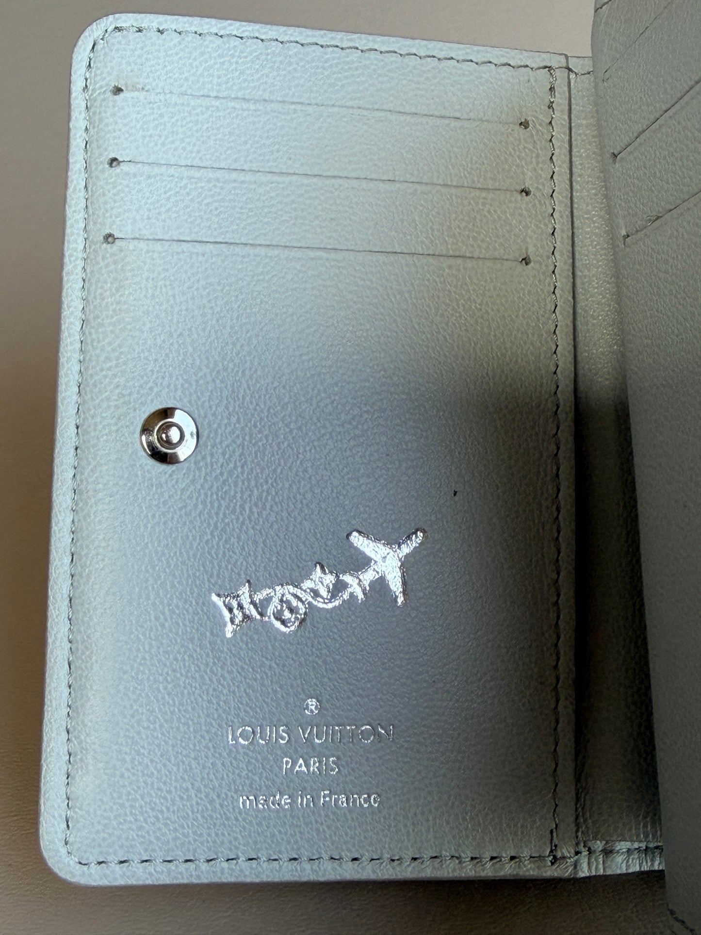 Louis Vuitton Coussin Lou Wallet LV Ski Monogram Embossed Lambskin Grey 72953