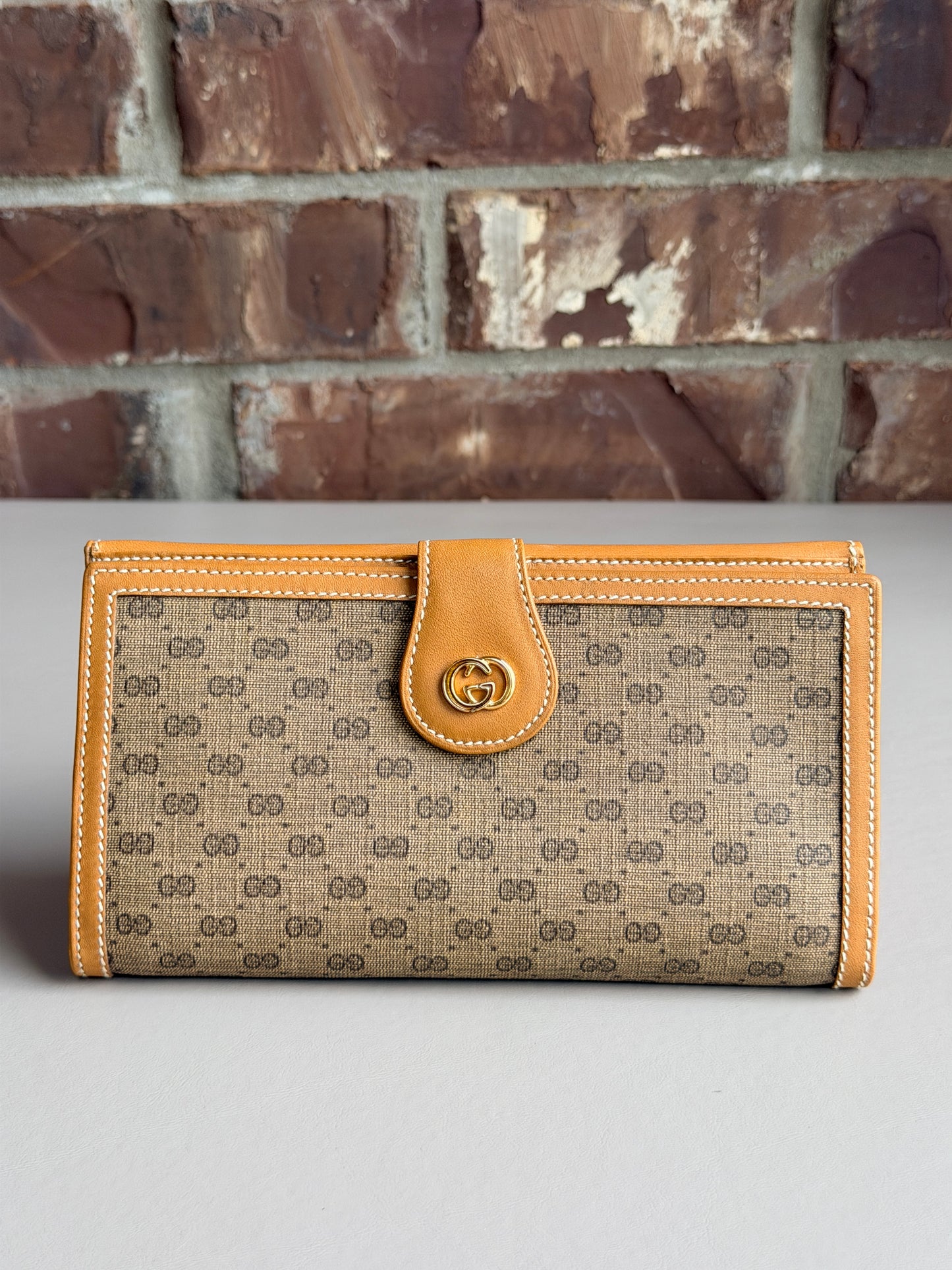 Gucci Guccissima Monogram Coated Canvas 64743