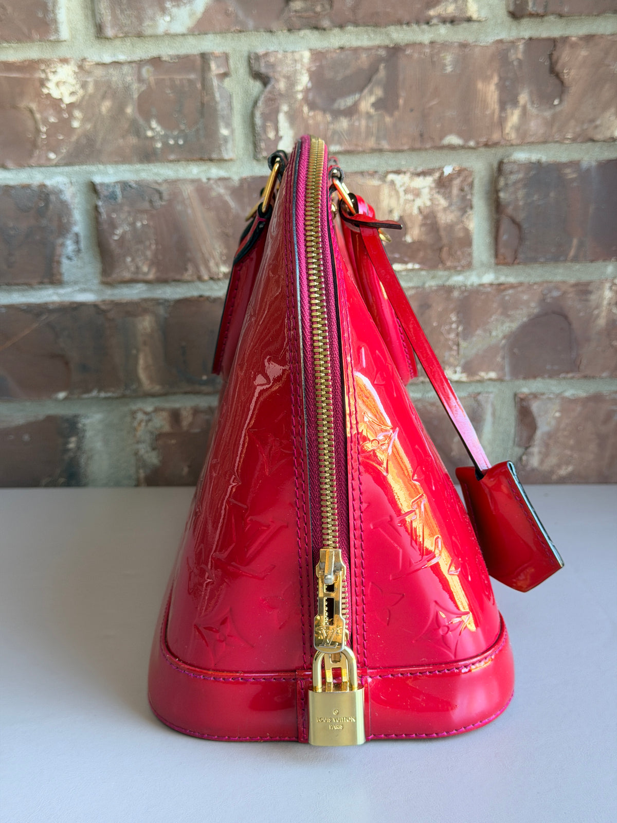 Louis Vuitton Alma Handbag Monogram Vernis PM Raspberry 57283
