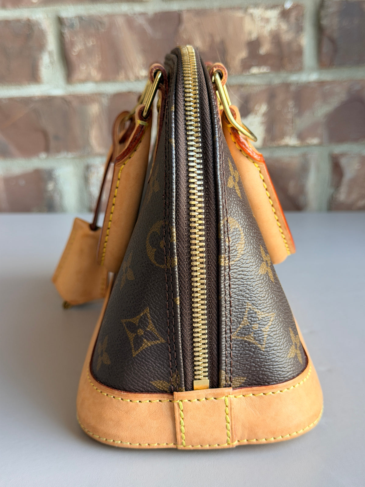 Louis Vuitton Alma Handbag Monogram Canvas BB 48735