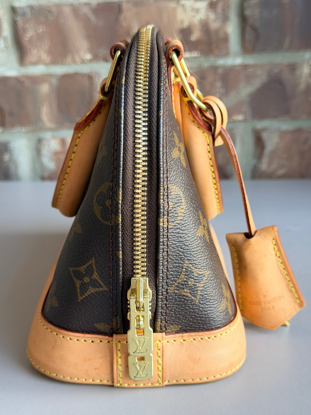 Louis Vuitton Alma Handbag Monogram Canvas BB 48735