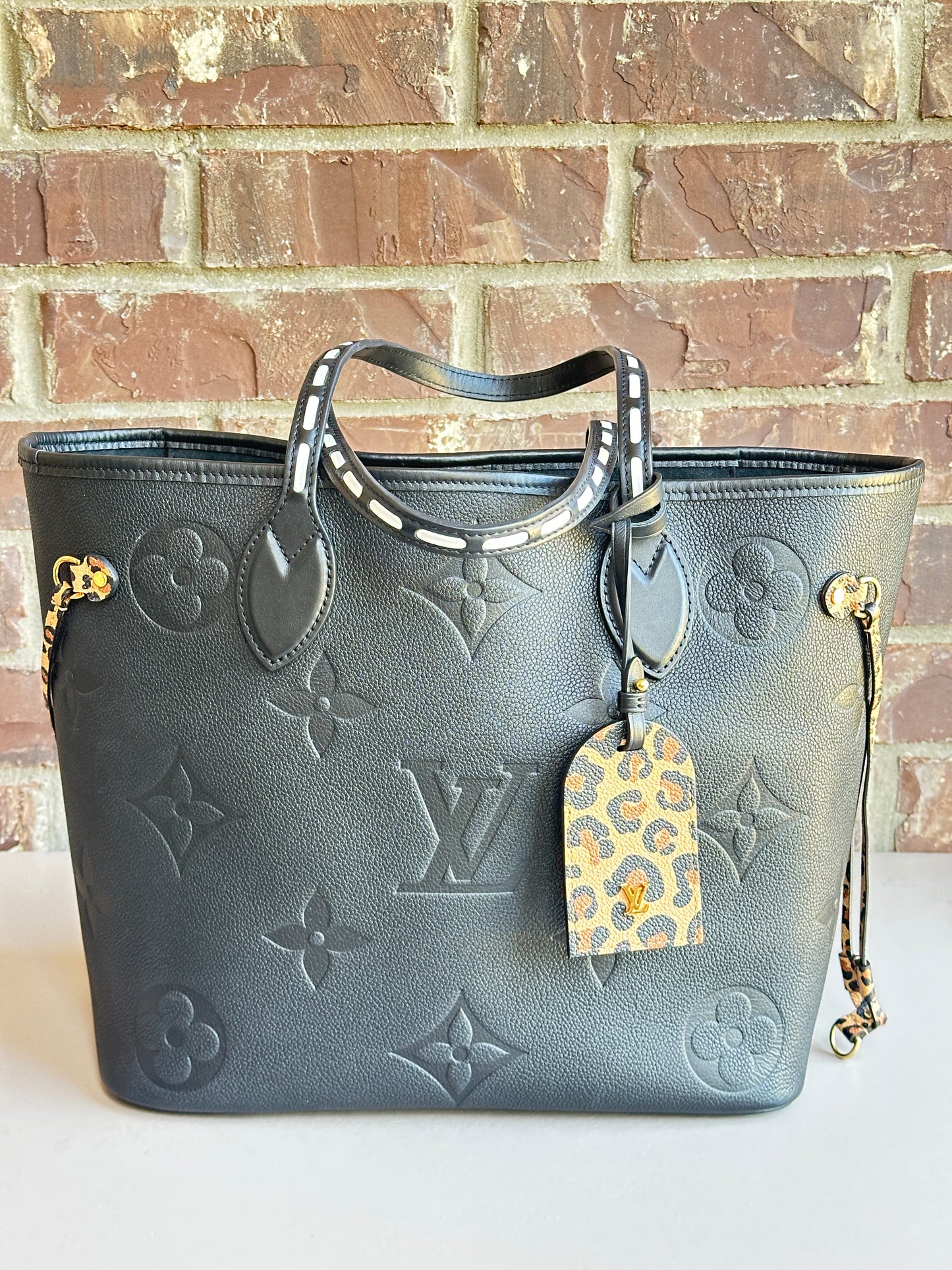 Louis Vuitton Neverfull Wild at Heart Monogram Empreinte Giant MM	 Black 43782